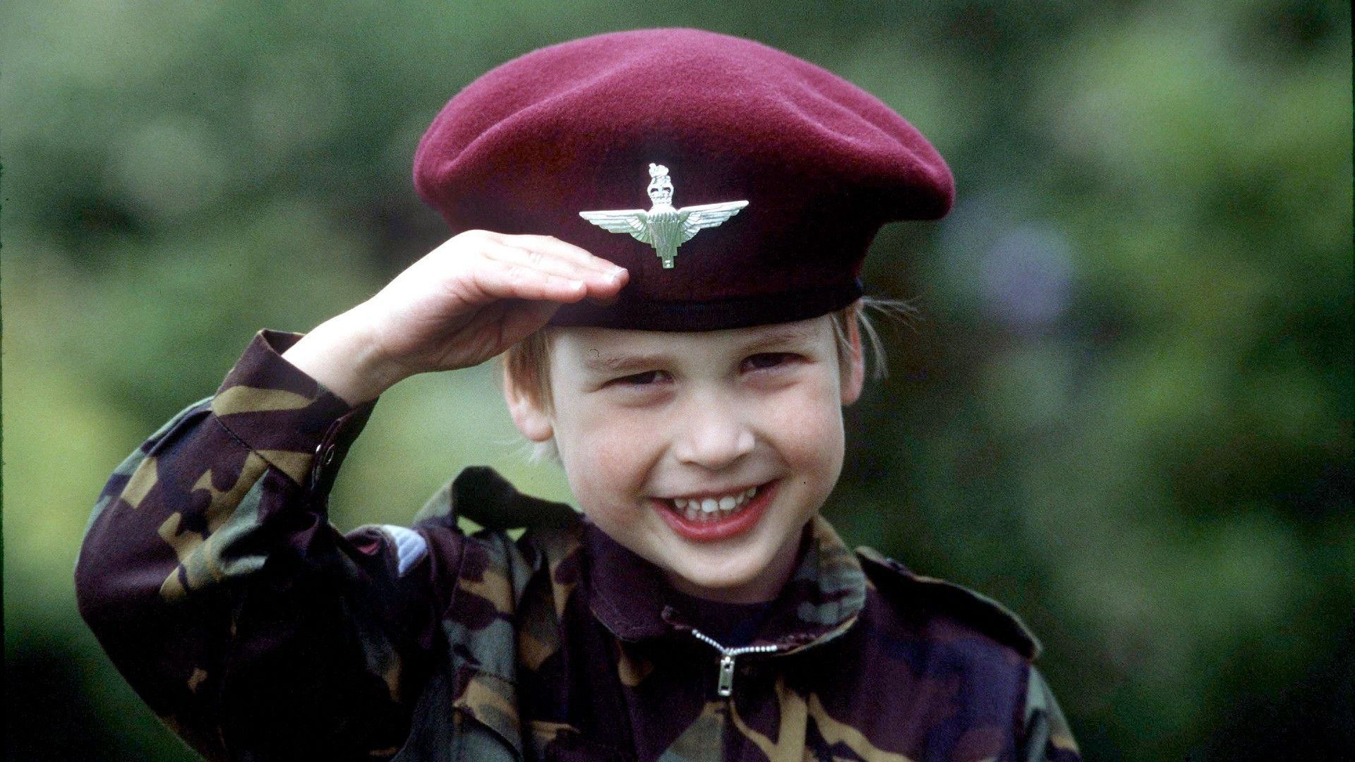 <p>                     Looking like butter wouldn't melt, a young Prince William posed in the Parachute Regiment Uniform at the gardens of King Charles' Highgrove estate in 1986.                   </p>                                      <p>                     While it can't be confirmed, this could be one of the Prince's first military salutes caught on camera - but far from his last. After university, William trained at the Royal Military Academy Sandhurst before serving with the Blues and Royals.                   </p>                                      <p>                     He also flew for the RAF search and rescue team and served as an ambulance pilot for two years.                   </p>