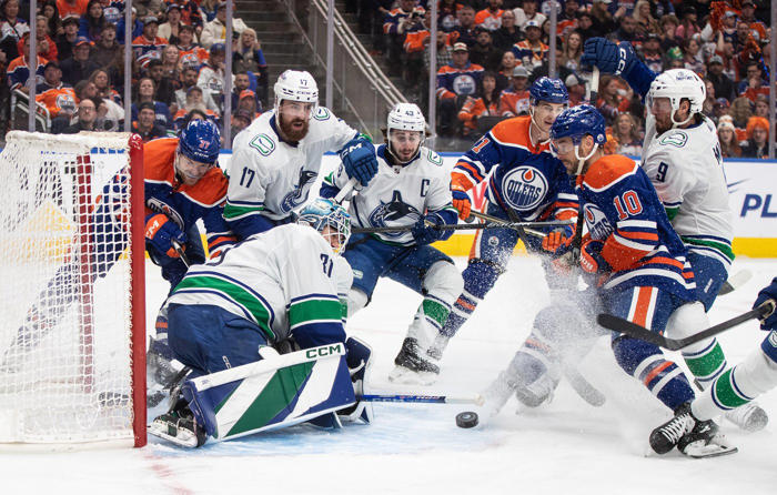 oilers crank up the offence, drill canucks 5-1 to force game 7