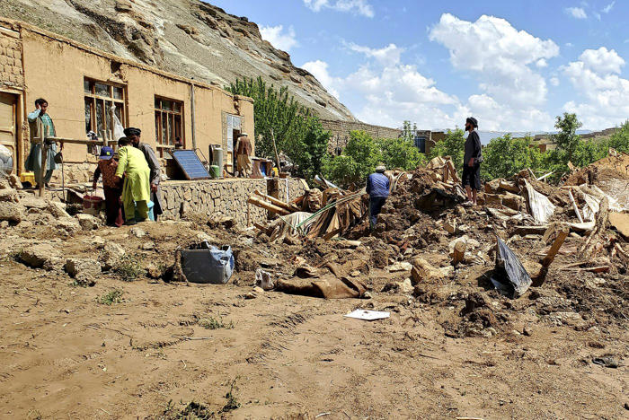 heavy rains set off flash floods in northern afghanistan, killing at least 84 people