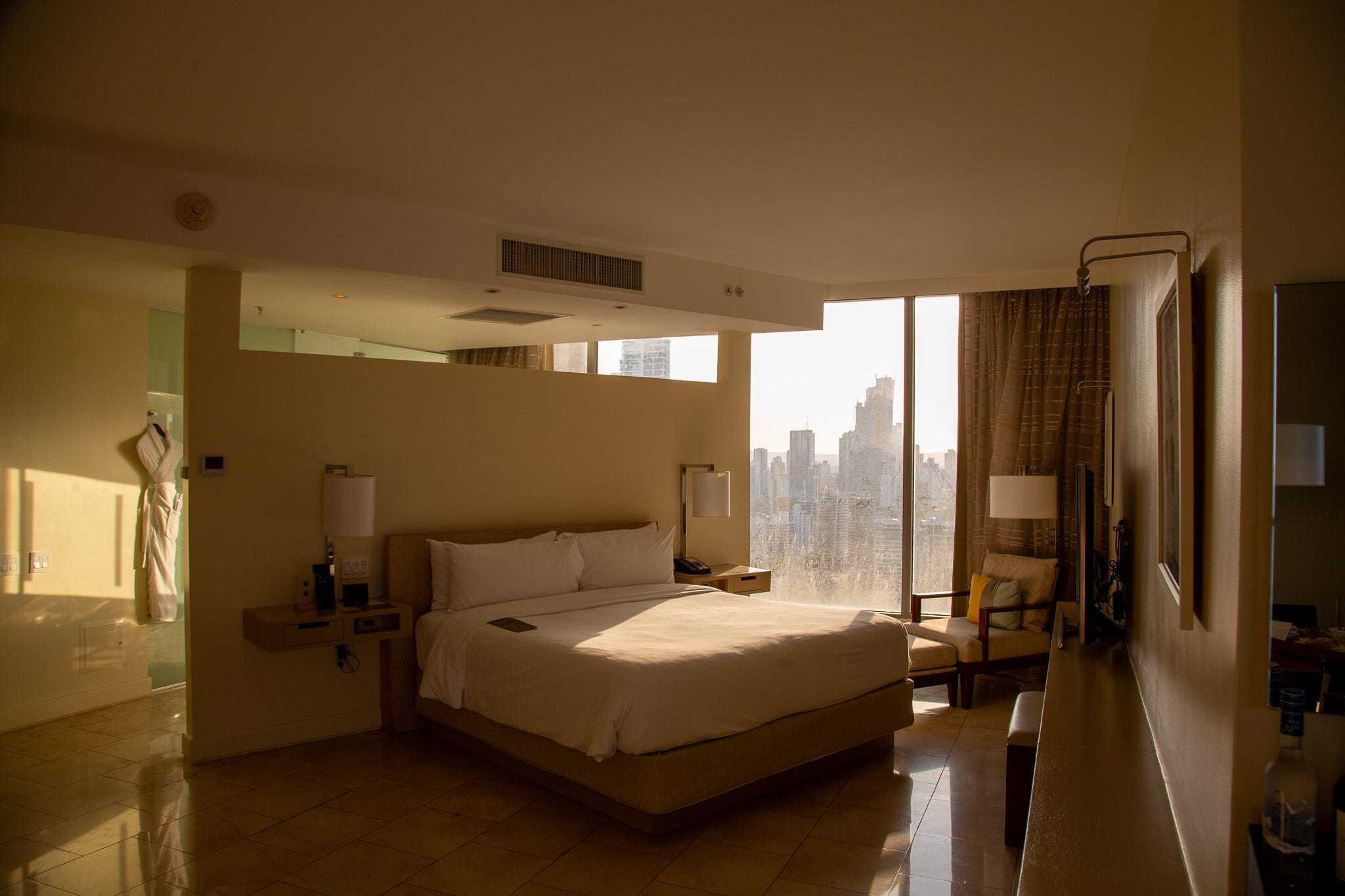 <p>A night at the JW Marriott felt like the ideal way to experience Panama's richest neighborhood. So, at 4 p.m., I arrived at the skyscraper and headed to the hotel's lobby on floor 16.</p><p>I received a key to my suite and headed to floor 31. Golden light cast across the room as I stepped inside. The suite had an open concept, with a shower and bathtub looking to Panama City's skyline.</p><p>According to TripAdvisor, standard rooms typically cost between $193 and $290 for a night. BI received a media rate for the room.</p>