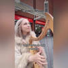 Busker offers perfect response to rude passer-by berating her on London street<br>