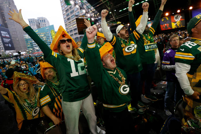 'packed' friday night: northern wisconsin hs football games clash with green bay's nfl opener