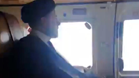 A screen grab from an IRIB via Tasnim News video shows Raisi on a helicopter in Iran on May 19. - IRIB via Tasnim News