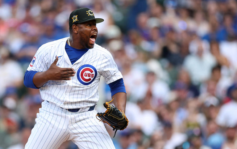Cubs relief pitcher Héctor Neris (51) celebrates after closing out the Pittsburgh Pirates in the ninth inning at Wrigley Field on May 18, 2024.