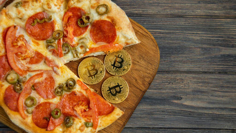 Bitcoin Pizza Week: Crypto Spent On 2 Yummy Pies 14 Years Ago Could Now Buy Jeff Bezos' Yacht And Elon Musk's Jet Fleet — With Spare Change!