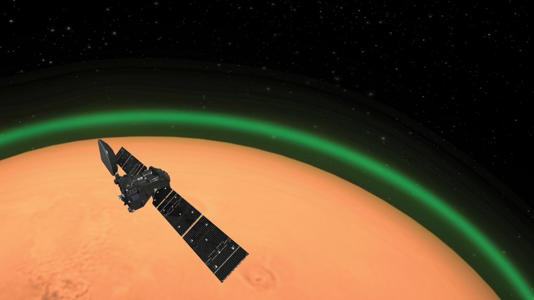 Artist's impression of ESA's ExoMars Trace Gas Orbiter above Mars. (ESA via SWNS)