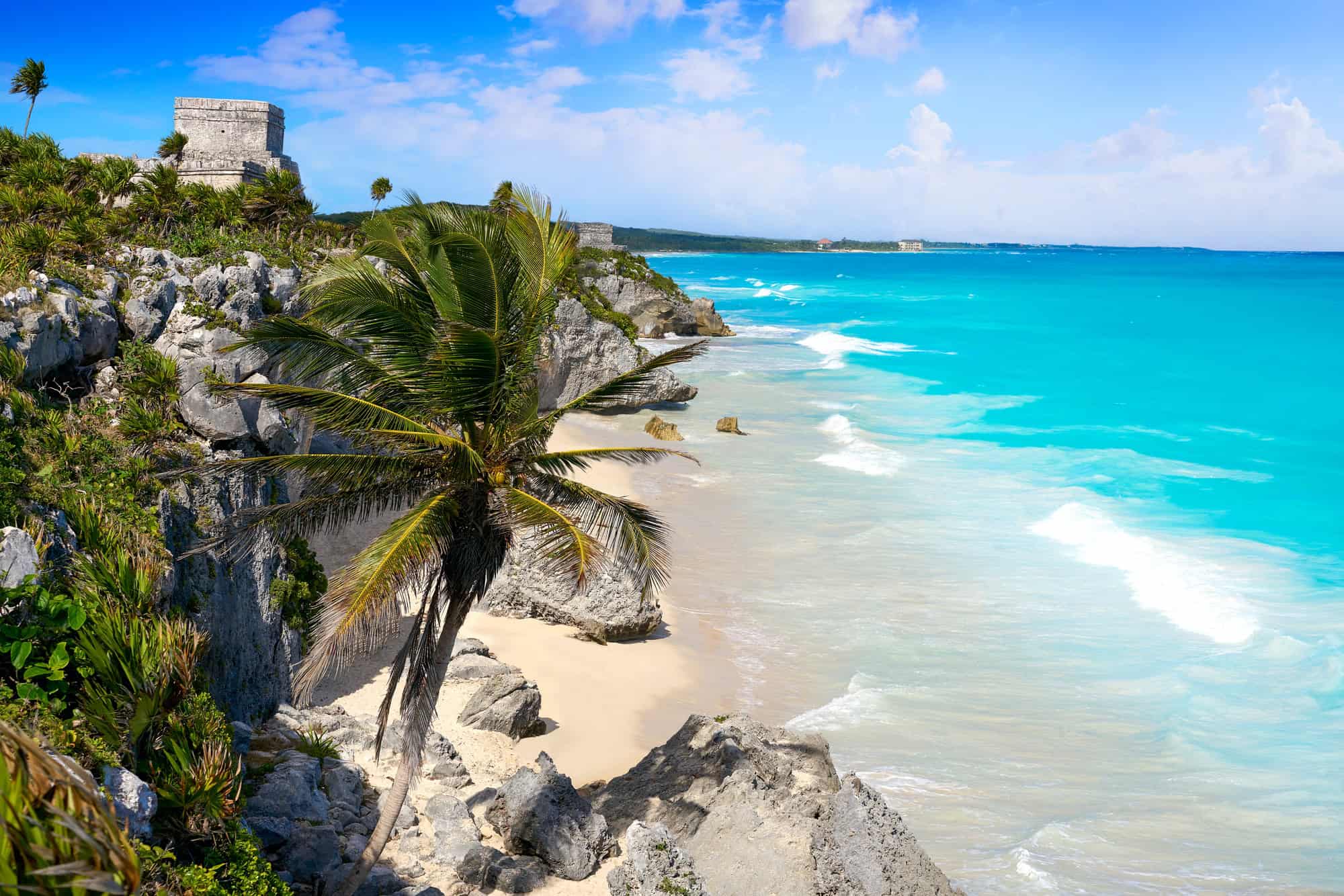<p>Tulum Beach, nestled on the Yucatán Peninsula of Mexico, offers more than just its pristine sands and crystal-clear waters. This unique destination is steeped in history, with the ancient Mayan ruins of El Castillo perched dramatically atop a 39-foot cliff overlooking the Caribbean Sea. </p> <p>Here, history enthusiasts and beach lovers alike can explore the remains of a 13th-century Mayan port city, then relax on the soft white sands or snorkel in the vibrant coral reefs teeming with marine life. Whether you’re drawn by the historical allure or the natural beauty, Tulum Beach is a compelling addition to any summer bucket list.</p>