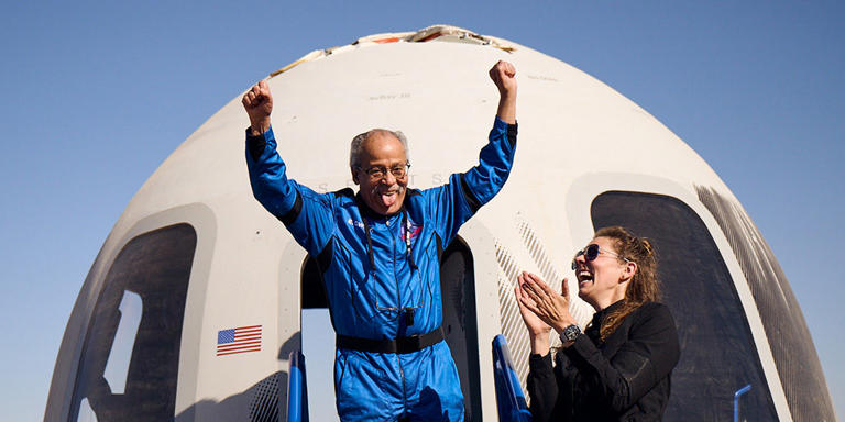 Ed Dwight celebrates after landing back on Earth following Sunday morning's ten-minute flight to space.