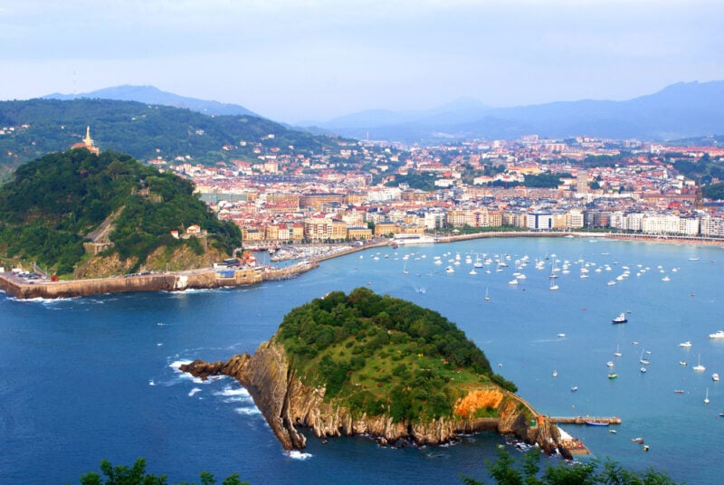 <p>Located in the Basque Country, San Sebastián is famous for its beautiful La Concha beach, exquisite culinary scene, and the annual San Sebastián International Film Festival.</p>