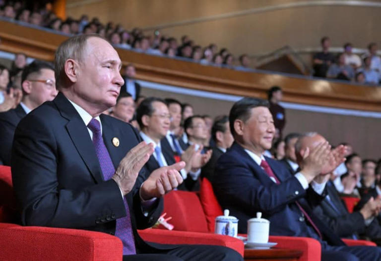 Russian President Vladimir Putin (L) and Chinese President Xi Jinping (L) attend a concert in Beijing, China, on May 16, 2024, marking the 75th anniversary of the establishment of diplomatic relations between Russia and China. (Sergei Guneyev/POOL/AFP via Getty Images)