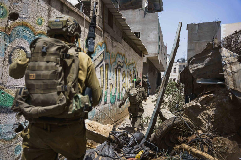 This handout picture released by Israel's army on May 21, 2024, shows soldiers operating in the Gaza Strip amid the ongoing conflict between Israel and the Palestinian militant group Hamas.