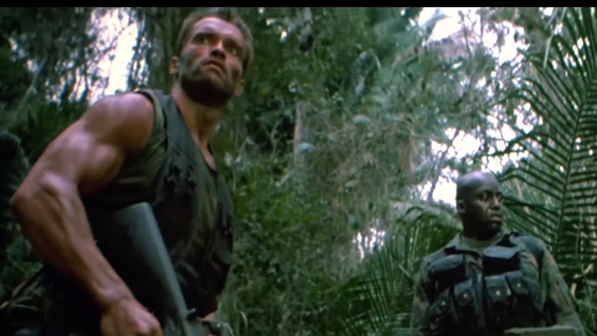 <p>What makes 1987’s <em>Predator</em> such a great movie is that it mixes together so many genres. Yes, this is a macho 80s action flick! However, John McTiernan also mixes in a ton of sci-fi and even a little bit of horror, too. It is a story about a group of soldiers of fortune led by Arnold Schwarzenegger's Dutch. Dutch and his men are sent into a jungle under false pretenses. </p>  <p>Rather than dealing with soldiers and rebels, they find themselves in a fight for survival against one of the most iconic movie characters of all time, the Predator! This is such a fun movie that never ages! It helps that Arnold is surrounded by some real macho dudes such as Carl Weather’s Dylan, who may or may not have been pushing one too many pencils. With incredible practical effects, Predator is an absolute all time classic of the 80s! Thankfully, the <em>Predator</em> franchise is still going strong to this day with the recent <em>Prey</em> movie being fantastic!</p>