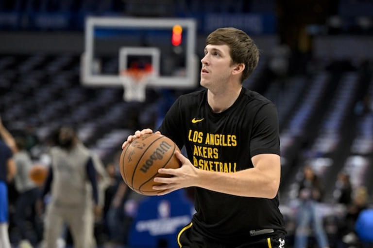 Dec 12, 2023; Dallas, Texas, USA; Los Angeles Lakers guard Austin Reaves (15) warms up before the game between the Dallas Mavericks and the Los Angeles Lakers at the American Airlines Center. Mandatory Credit: Jerome Miron-USA TODAY Sports