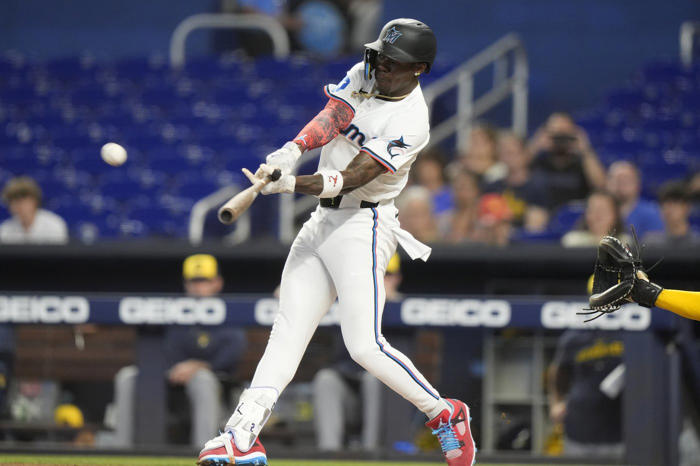 luzardo throws eight scoreless innings and chisholm homers as marlins shut out brewers 1-0
