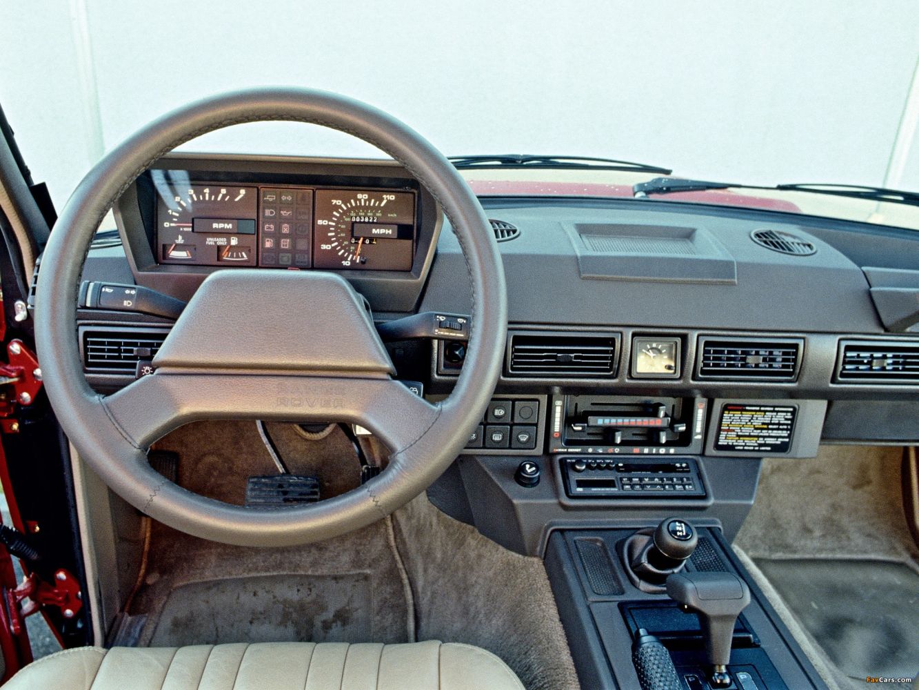 <p>After the introduction of the four-door Range Rover, the model began a steady move out of the utility-vehicle segment and into luxury territory. Leather upholstery and an automatic transmission became available in 1984; a redesigned dashboard and wood interior trim came in 1985. The exposed door hinges of early models were soon hidden for a more refined exterior, and dashboard switches from Austin and Rover luxury sedans were soon incorporated into the Range Rover’s interior. Officially, Range Rovers were not sold in America until 1987, but grey-market imports were common. 1992 saw the introduction of the Range Rover LWB, with a wheelbase stretched by eight inches to add legroom for rear-seat passengers. </p>