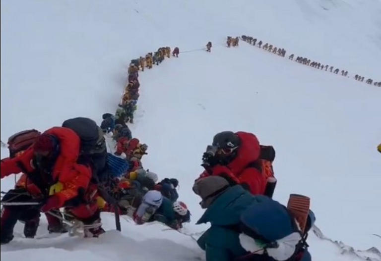 Queues and records: Mount Everest's climbing frenzy exposed