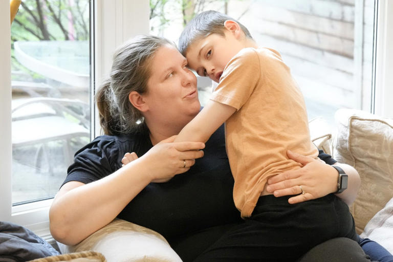 Alexis Wilson is photographed at home with her seven-year-old son Emmett, who has severe autism, in Thornhill, Ont., on Tuesday, April 30, 2024. THE CANADIAN PRESS/Chris Young