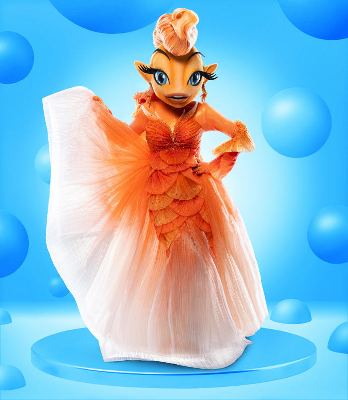 the masked singer's goldfish breaks free as the winner of season 11