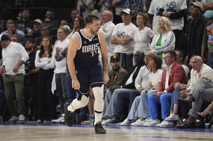 doncic leads strong close by mavericks for 108-105 win over wolves in game 1 of west finals