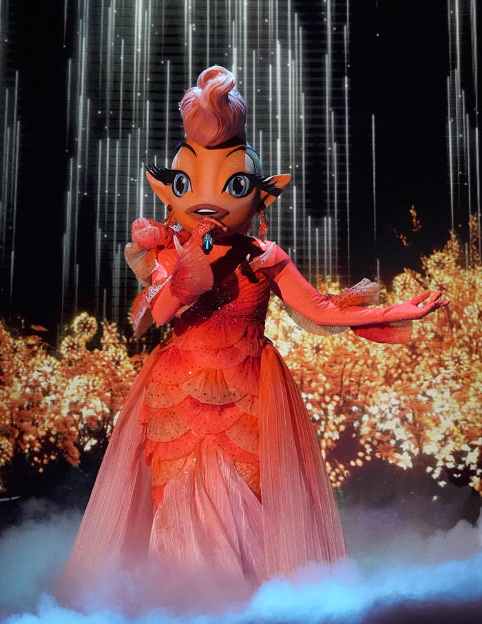the masked singer's goldfish breaks free as the winner of season 11