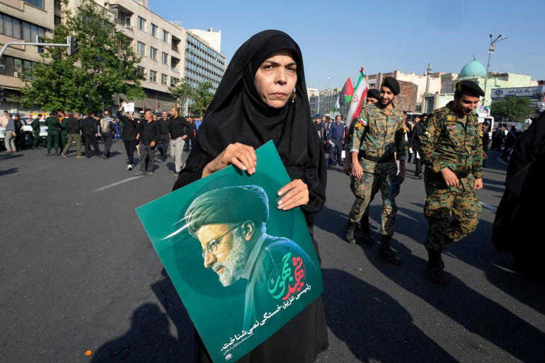 thousands march in iran to mourn raisi on final day of funeral