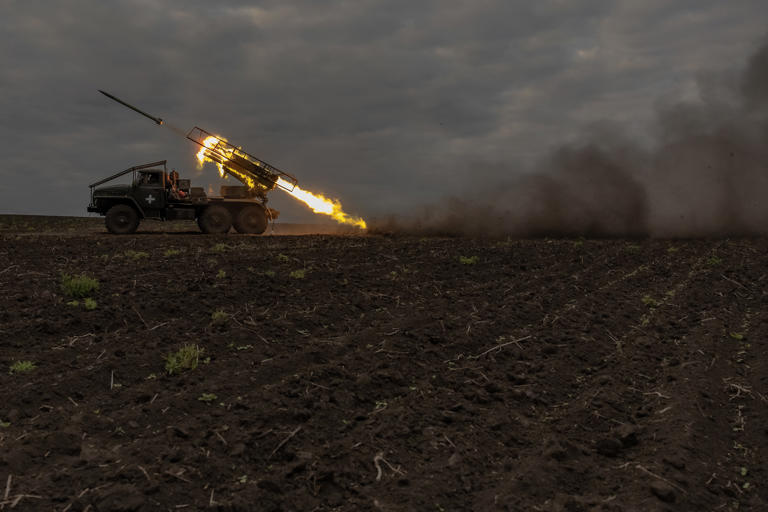 Ukrainian servicemen fire a BM-21 'Grad' multiple rocket launcher toward Russian positions, in the Kharkiv region, on May 15, 2024. Russia's expected summer offensive may now be underway, beginning with new cross-border operations in northeastern Kharkiv region.