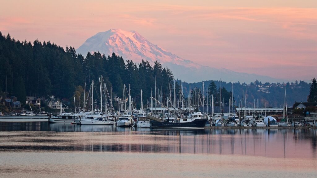 <p>Gig Harbor is a small maritime paradise just minutes from the hustle and bustle that is Tacoma and the rest of the I-5 corridor. The town’s namesake harbor has a narrow entrance protected by a natural spit that keeps the water calm no matter what is happening around the rest of the sound.</p><p>Gig Harbor’s small downtown is full of quaint shops, restaurants, and docks perfect for walking to check ou the boats that are traveling through town. The city’s historic boatshop is an incredible place to check out. There, you can see wooden boats under restoration or even rent old boats for puttering around the bay.</p>