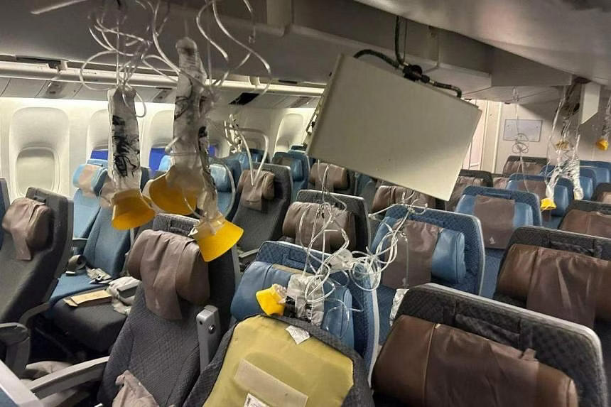filipino suffers neck fracture in singapore airlines turbulence incident