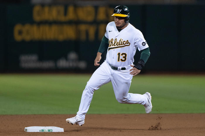 a's announce series of roster moves