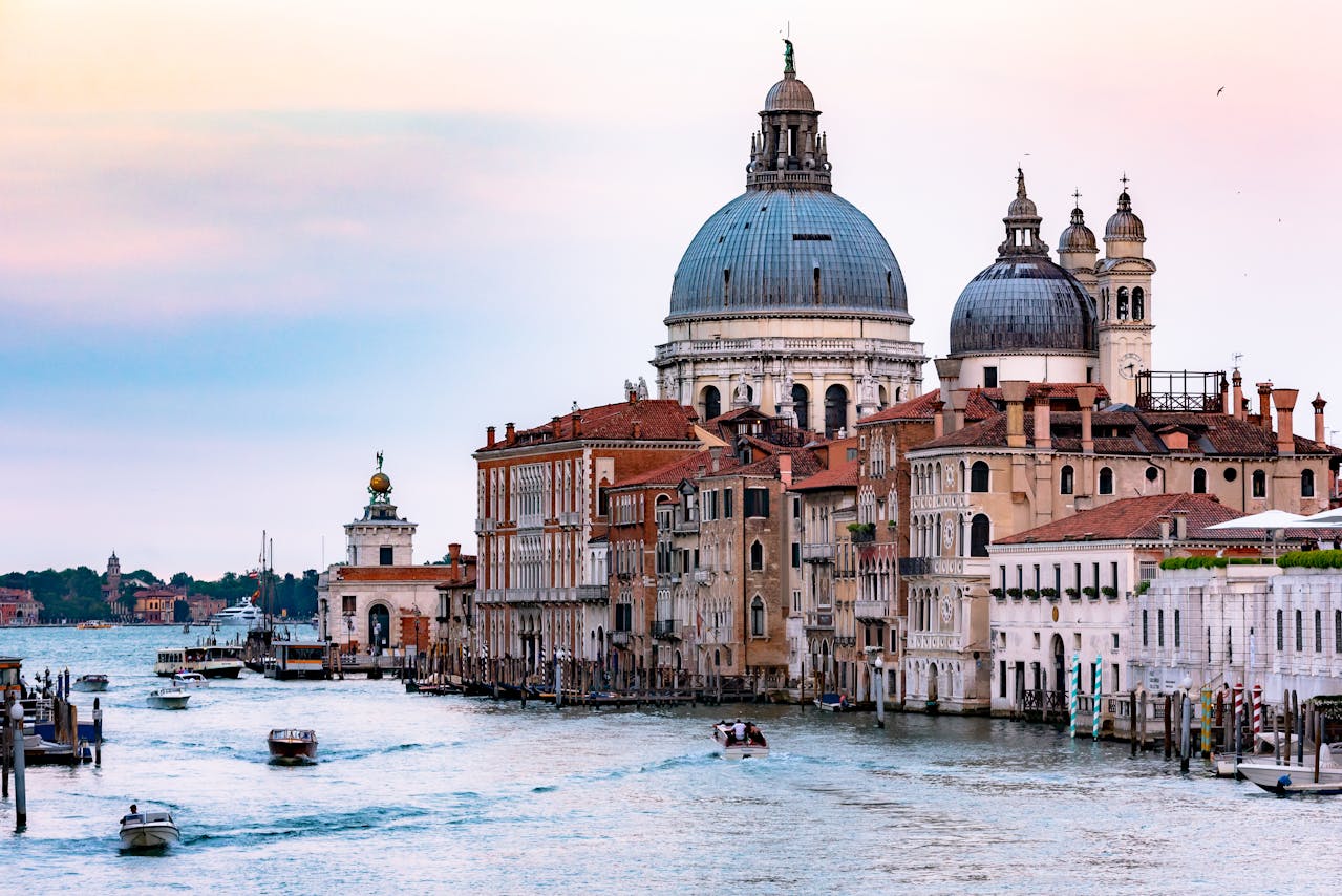 <p>The top three attractions in Venice include: St. Mark’s Basilica, Piazza San Marco, and the Rialto Bridge.</p>
