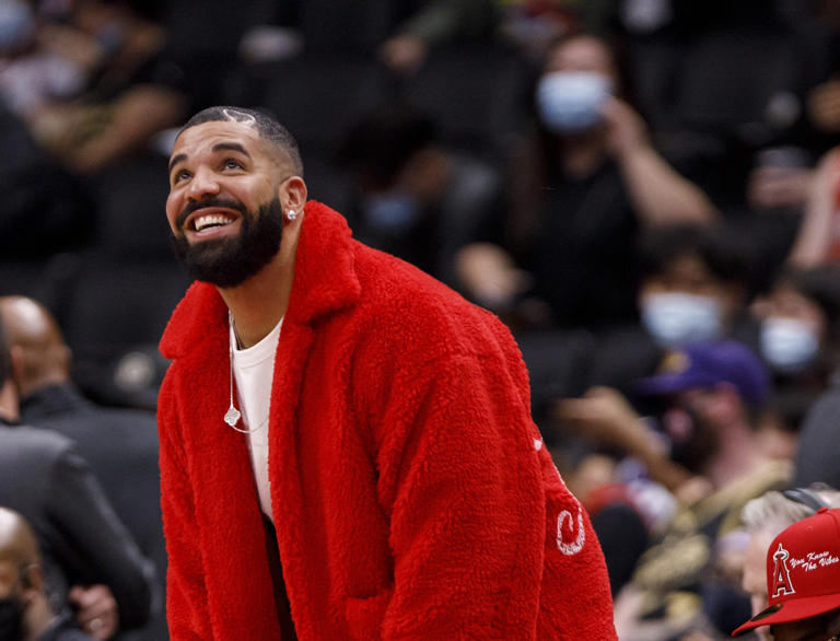 TORONTO, ON - OCTOBER 11: Drake attends a preseason NBA game between the Toronto Raptors and the Houston Rockets at Scotiabank Arena on October 11, 2021 in Toronto, Canada. NOTE TO USER: User expressly acknowledges and agrees that, by downloading and or using this Photograph, user is consenting to the terms and conditions of the Getty Images License Agreement. (Photo by Cole Burston/Getty Images) ORG XMIT: 775713870 ORIG FILE ID: 1235829116