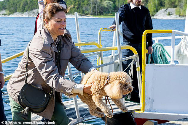 crown princess victoria of sweden takes pup rio to wwf meeting