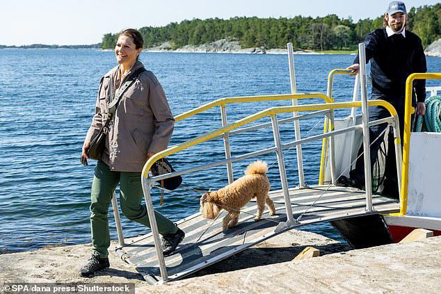 crown princess victoria of sweden takes pup rio to wwf meeting