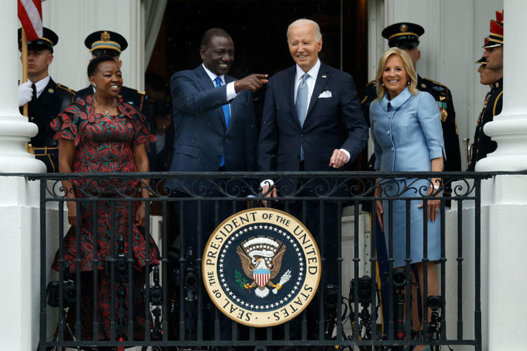 U.S. President Joe Biden, First Lady Jill Biden, Kenyan President William Ruto and his wife Rachel Ruto wave together during an arrival ceremony on the South Lawn of the White House on May 23, 2024, in Washington, D.C. During the state visit, Ruto and Biden will participate in a bilateral meeting, a joint press conference and state dinner. Ruto’s visit is the first official state visit to the White House by a leader from an African country since 2008. (Photo by Chip Somodevilla/Getty Images)
