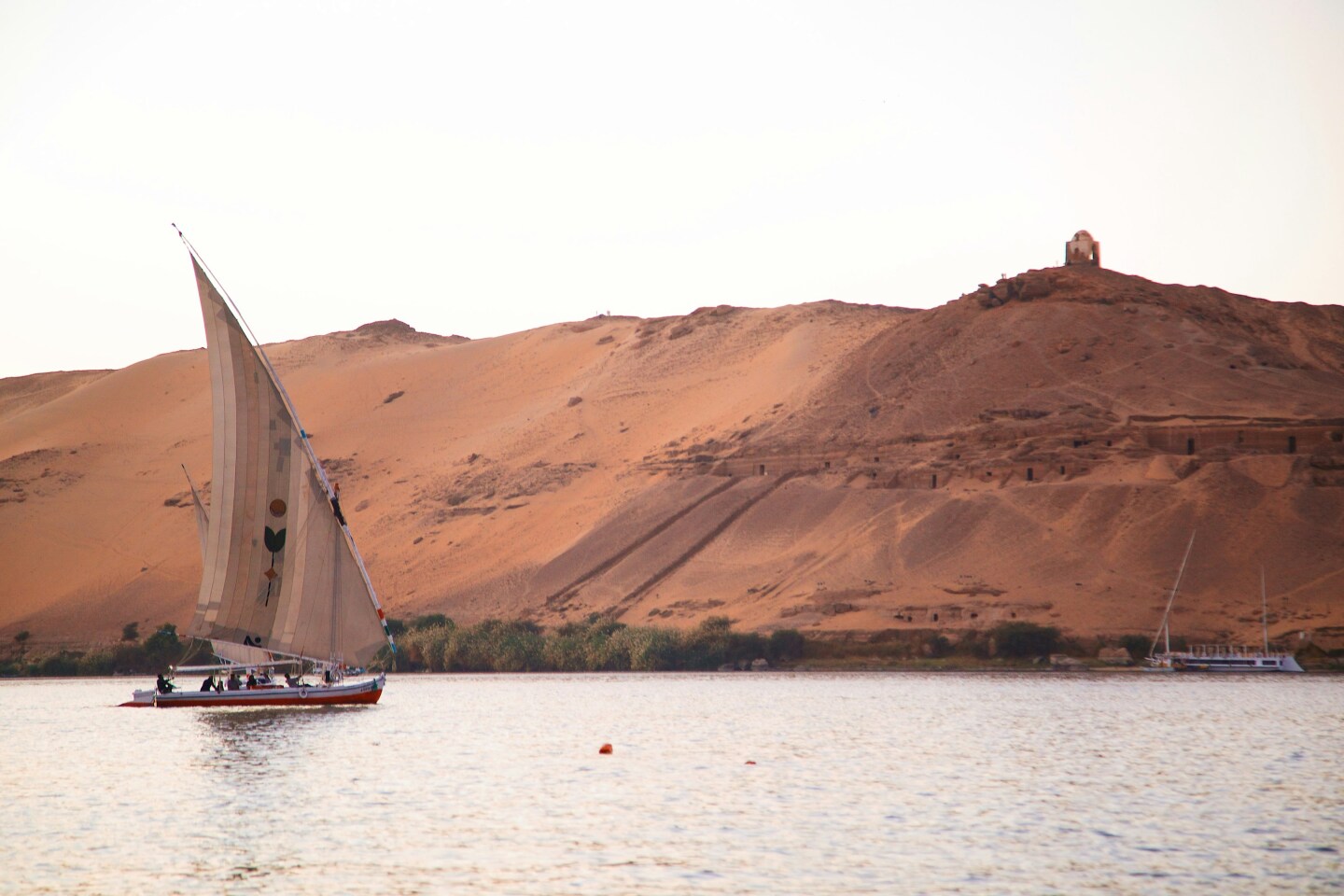 <a>On Lake Nasser, view sweeping desert landscapes en route to one of the most impressive ancient Egyptian sites: Abu Simbel.</a>