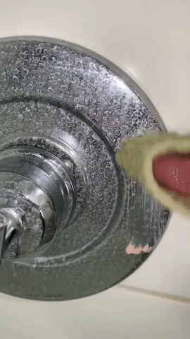 Reviewer using it to clear up hard water stains in tub