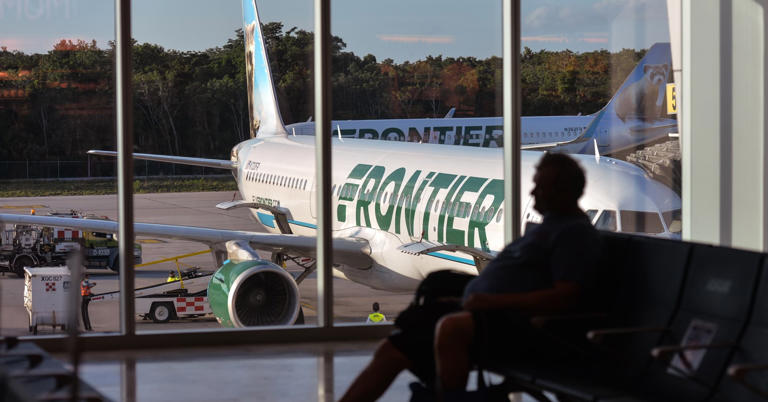Frontier Airlines plane seen at Cancun International Airport. On Wednesday, December 08, 2021, in Cancun International Airport, Cancun, Quintana Roo, Mexico.