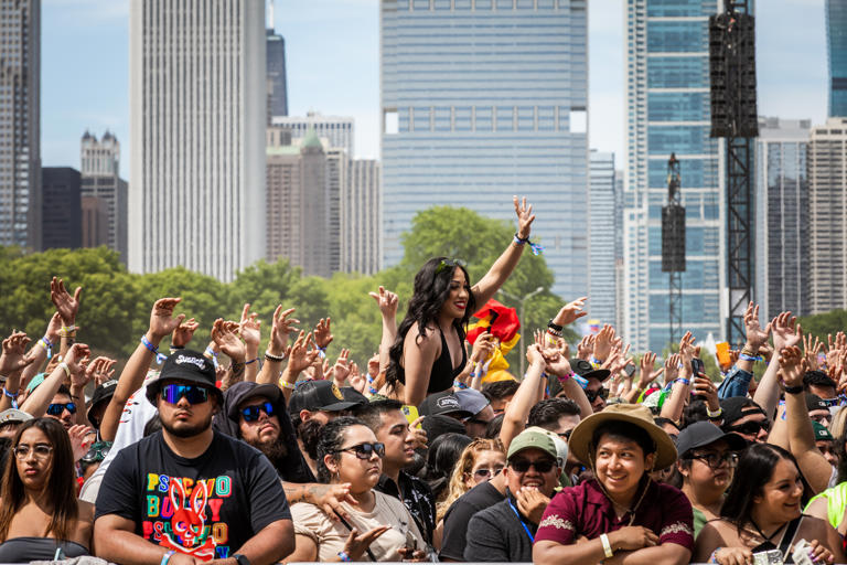 CHICAGO, ILLINOIS – MAY 28: Sueños Festival goers enjoy the sun and music against the Chicago skyline while at Grant Park on May 28, 2023 in Chicago, Illinois. (Photo by Natasha Moustache/Getty Images)