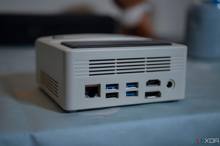 Ayaneo Mini Retro PC with Ethernet ports, USB ports, DisplayPort, HDMI, and power connector all showing