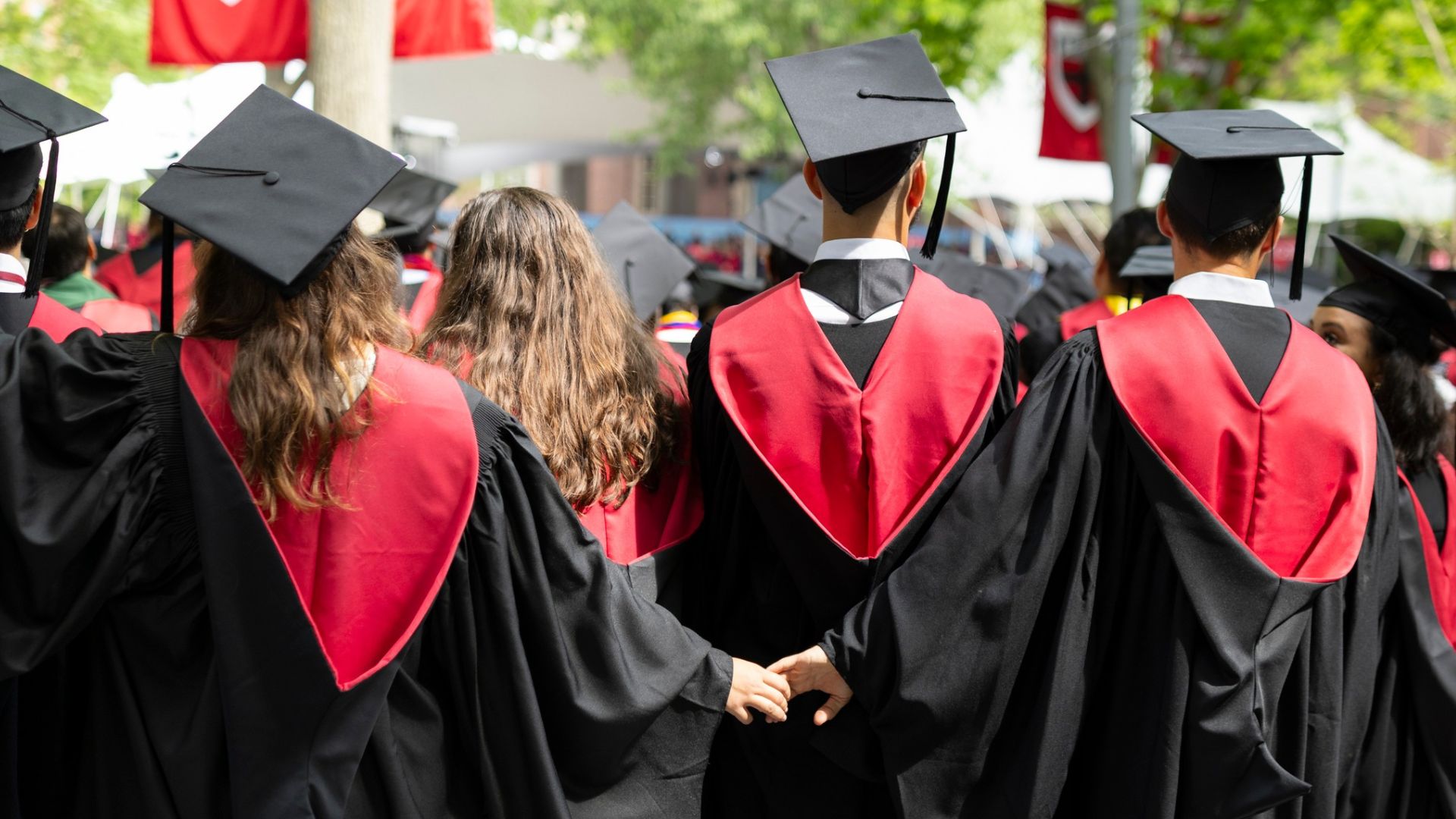 <p>Hundreds of attendees at the Harvard College graduation ceremony staged a walkout in protest against the disqualification of 13 students who had been involved in an earlier encampment.   </p> <p>This group was said to be involved in activities deemed inappropriate by the university, leading to their exclusion from the graduation ceremony.   </p>