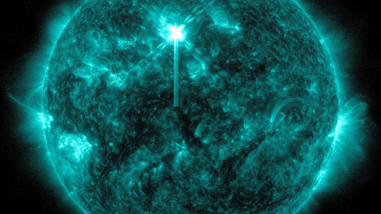 NASA’s Solar Dynamics Observatory captured this image of a solar flare in extreme ultraviolet light on May 2. The flare is the bright flash toward the upper middle area of the sun. - NASA/SDO
