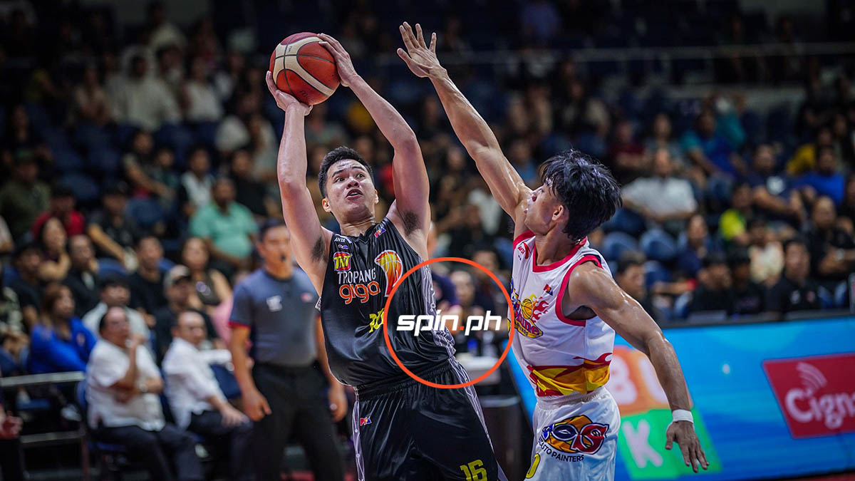 tnt catches fire late to bring down rain or shine in game one