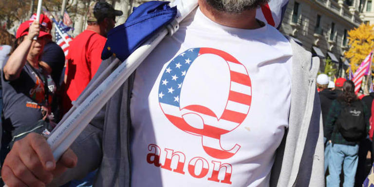 Man wearing a QAnon shirt during the Million MAGA March in November 2020. (