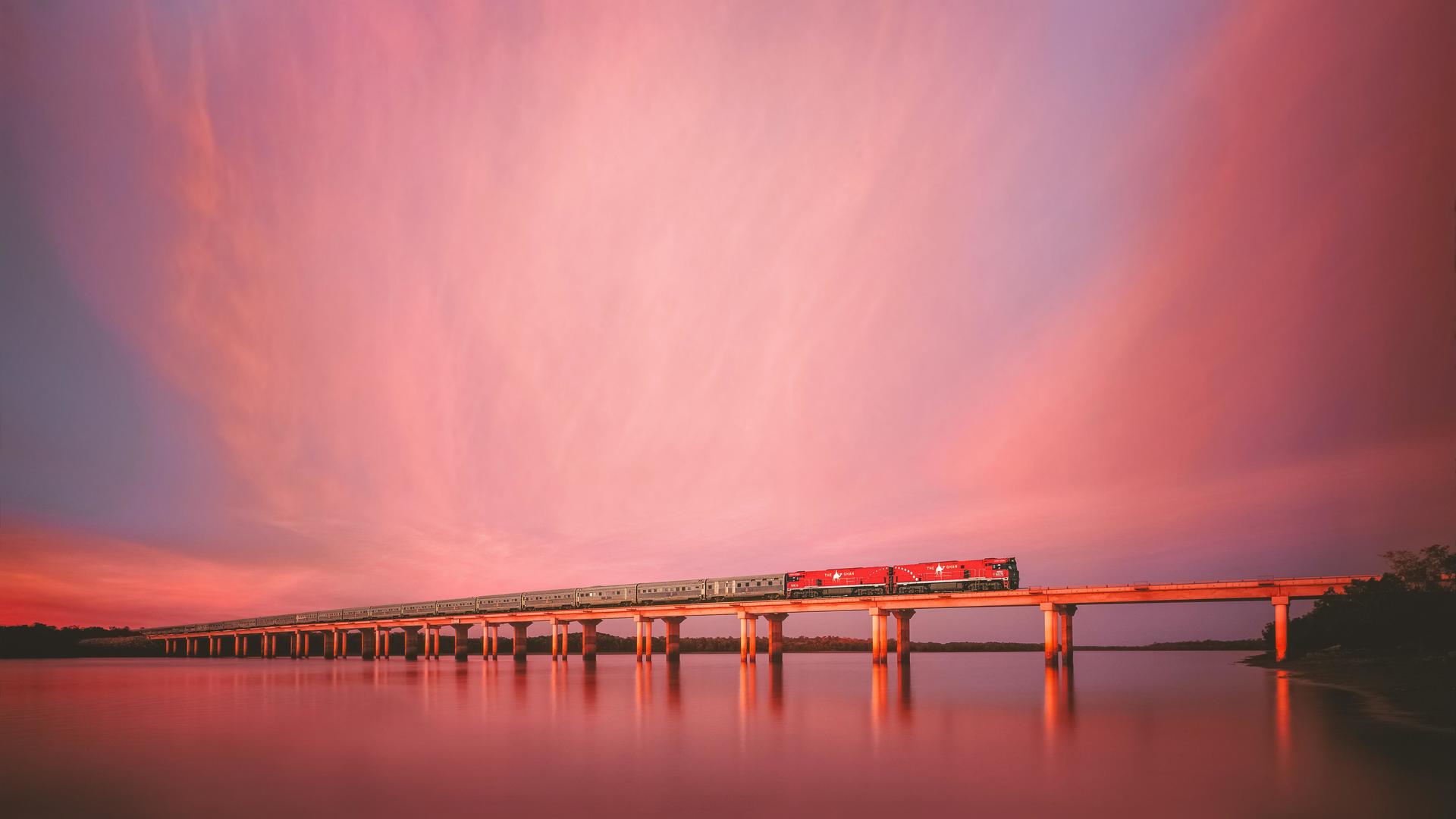 <p>Embark on an epic journey through the heart of Australia aboard The Ghan. This legendary train travels from Darwin in the north to Adelaide in the south,  showcasing the vast and diverse l<a href="https://www.australia.com/en/things-to-do/nature-and-national-parks/guide-to-the-australian-outback.html">andscapes of the Outback</a>. Experience the red desert, tropical forests, and the raw, rugged beauty of Australia’s interior. Enjoy comfortable accommodations, gourmet meals, and off-train excursions that bring you closer to the wonders of the Outback, giving you a true taste of the land Down Under. Moreover, stops like Alice Springs let you explore iconic Outback towns and learn about Aboriginal cultures that have thrived in these landscapes for thousands of years.</p>