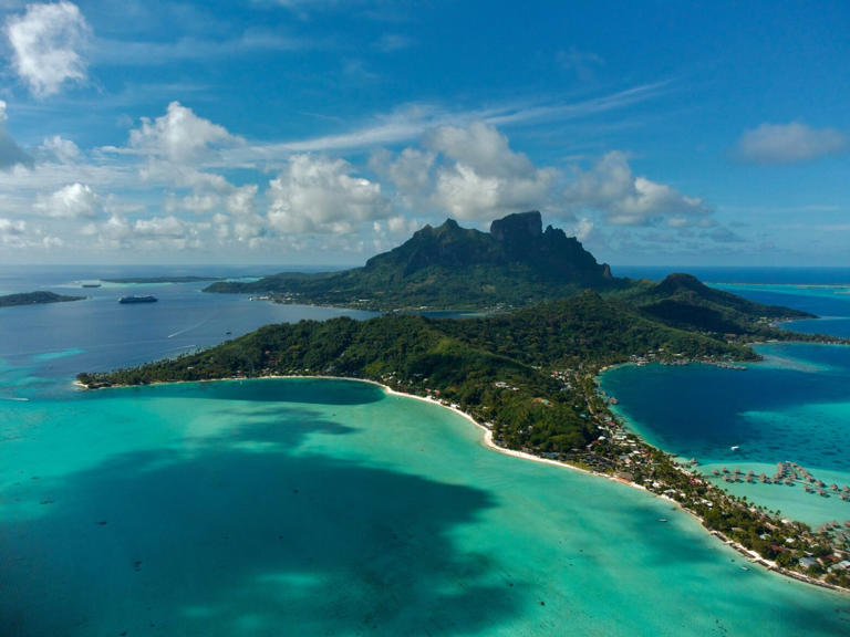 These are the top eight reasons travelers should visit Bora Bora in July. pictured: the island of Bora Bora