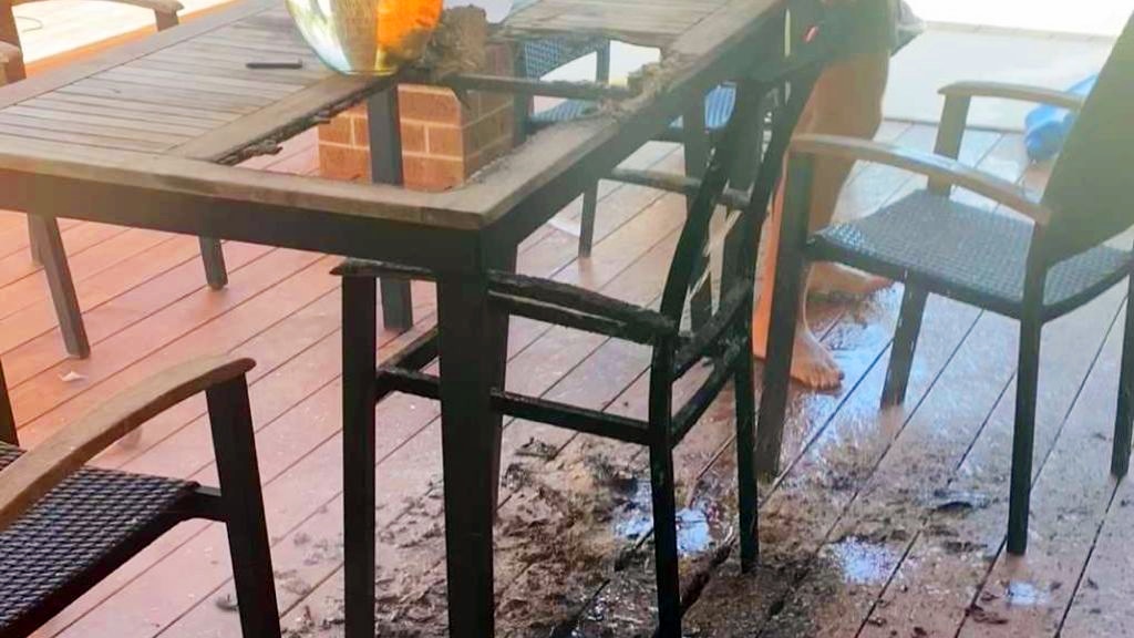 glass vase burns hole through farmer's wooden deck and furniture in near-disastrous magnifying effect