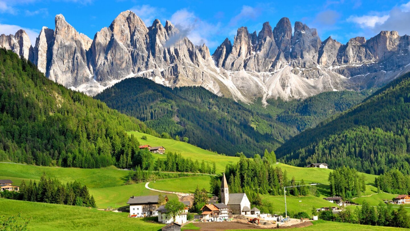 <p>The Dolomites are home to some of the most unreal landscapes in Italy, surrounded by steep limestone walls and high peaks. Each season transforms the scenery, from lush green meadows in summer to spectacular snow-capped mountains in winter. Just looking at this picture can transport anyone from their desk to this magical landscape.</p>