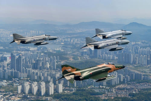 F-4 Phantom II aircraft stage a commemorative flight above Suwon, just south of Seoul, on May 9, 2024, in this photo provided by the Air Force on May 12. (PHOTO NOT FOR SALE) (Yonhap)