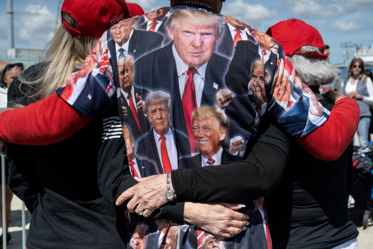 Trump supporters wait for the former US president to take to the stage on Saturday at his rally in Wildwood, New Jersey. Photo: Reuters