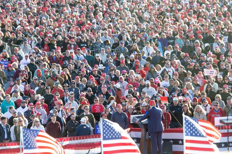 Donald Trump hit the campaign trail at a massive rally in Wildwood, NJ, Saturday, where he blasted President Biden as a "total moron."